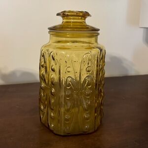 Vintage Federal Glass Jar with lid Harvest Gold Amber MCM
Atterbury Scroll